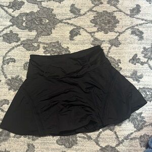 Black skort with detailing on the sides